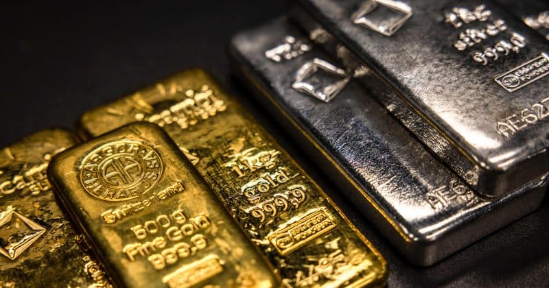 Gold and silver slide after record highs as profit-taking hits metals and markets